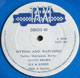 Sitting And Watching blue vinyl on Taxi 12" label