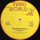 Pressure & Slide  on Third World label
